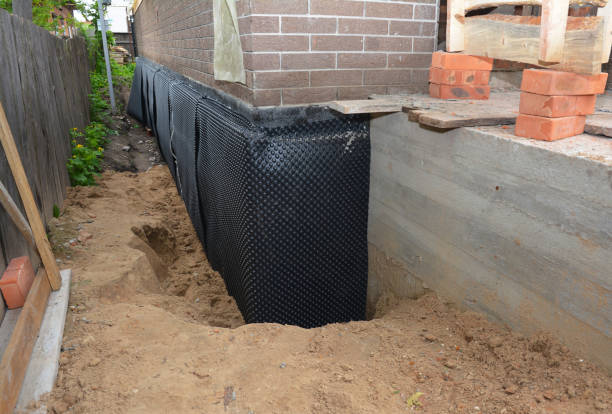 Happy homeowners after waterproofing job in Docena